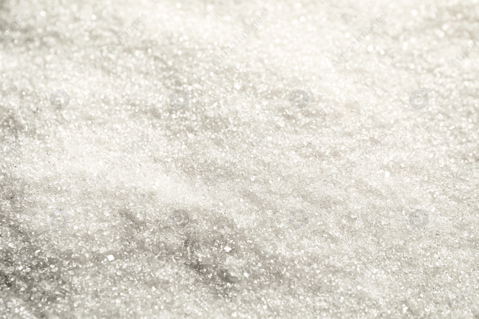 Photo of Pile of granulated sugar as background, closeup