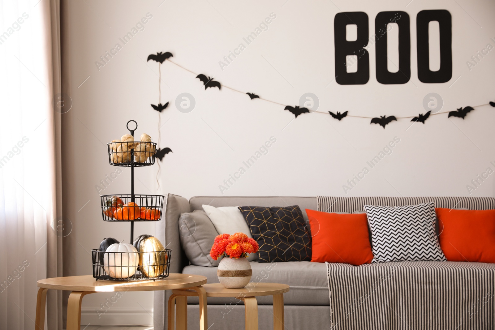 Photo of Modern room decorated for Halloween. Festive interior