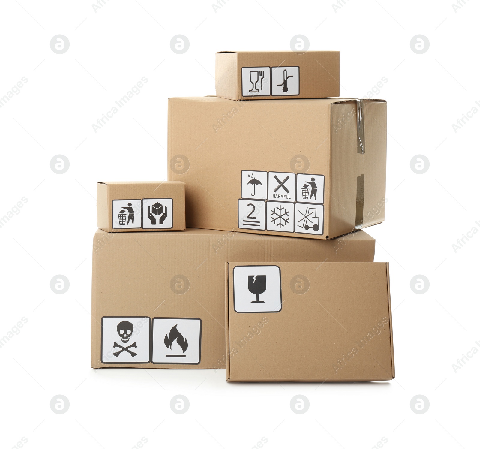 Photo of Cardboard boxes with different packaging symbols on white background. Parcel delivery