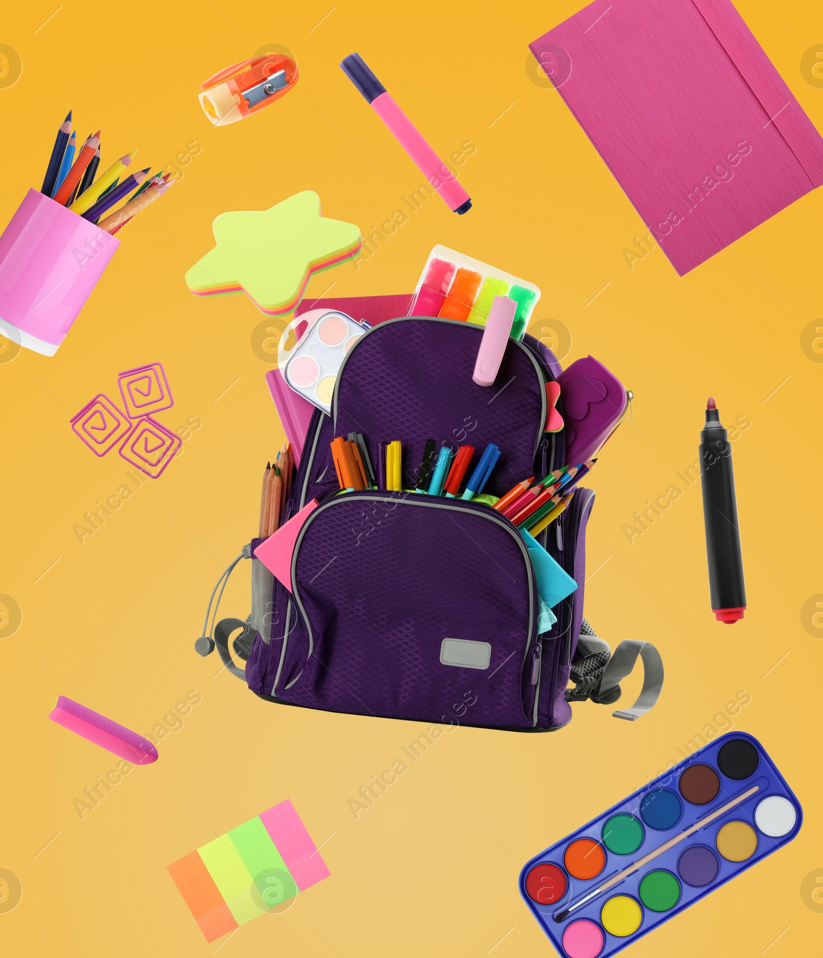 Image of Backpack surrounded by flying school stationery on yellow background