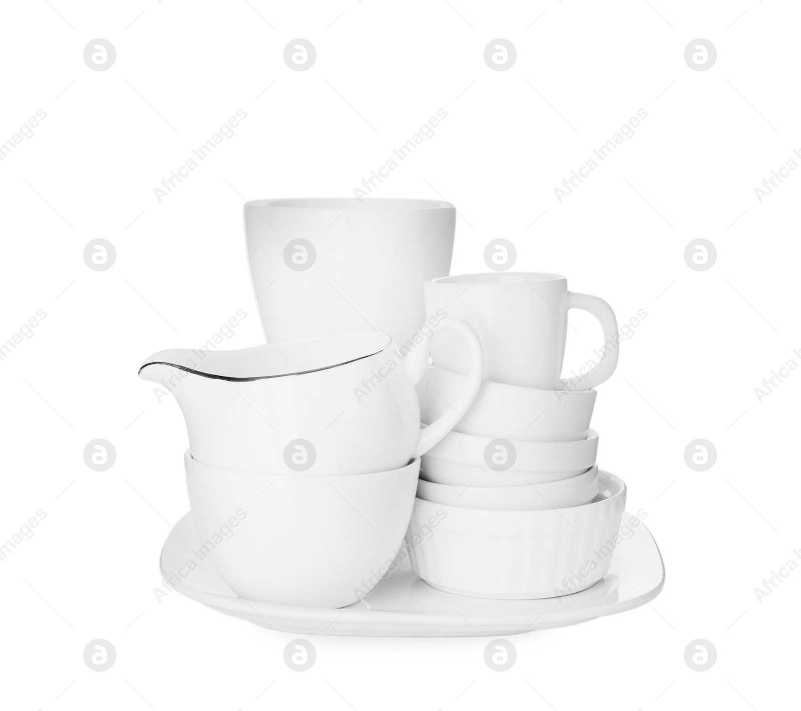 Photo of Set of clean dishes on white background