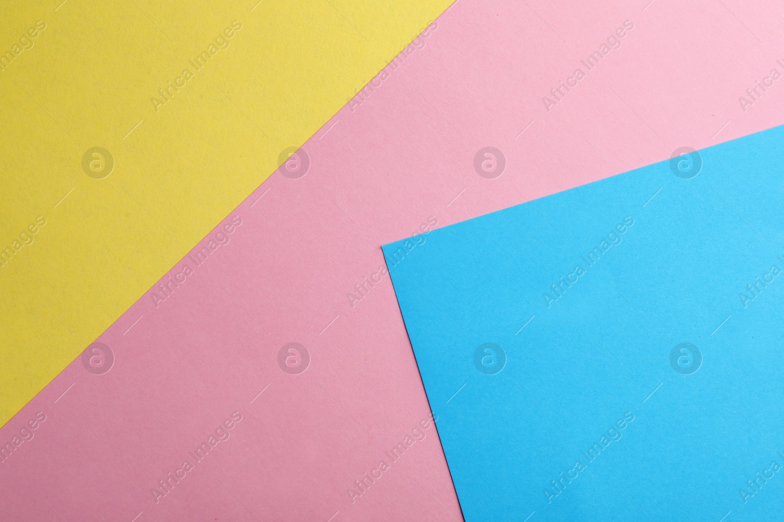 Photo of Colorful paper sheets as background, top view