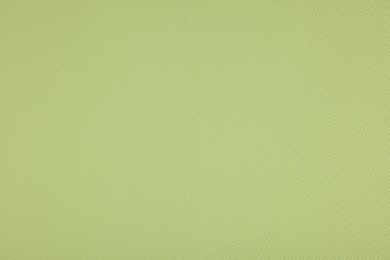 Photo of Stylish green wallpaper as background, closeup view