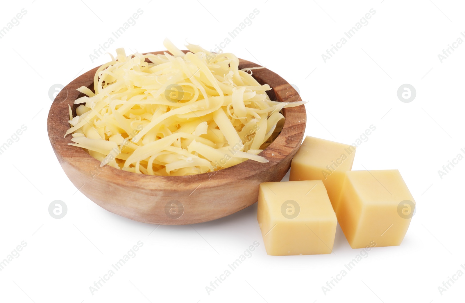 Photo of Grated cheese in bowl and pieces of one isolated on white