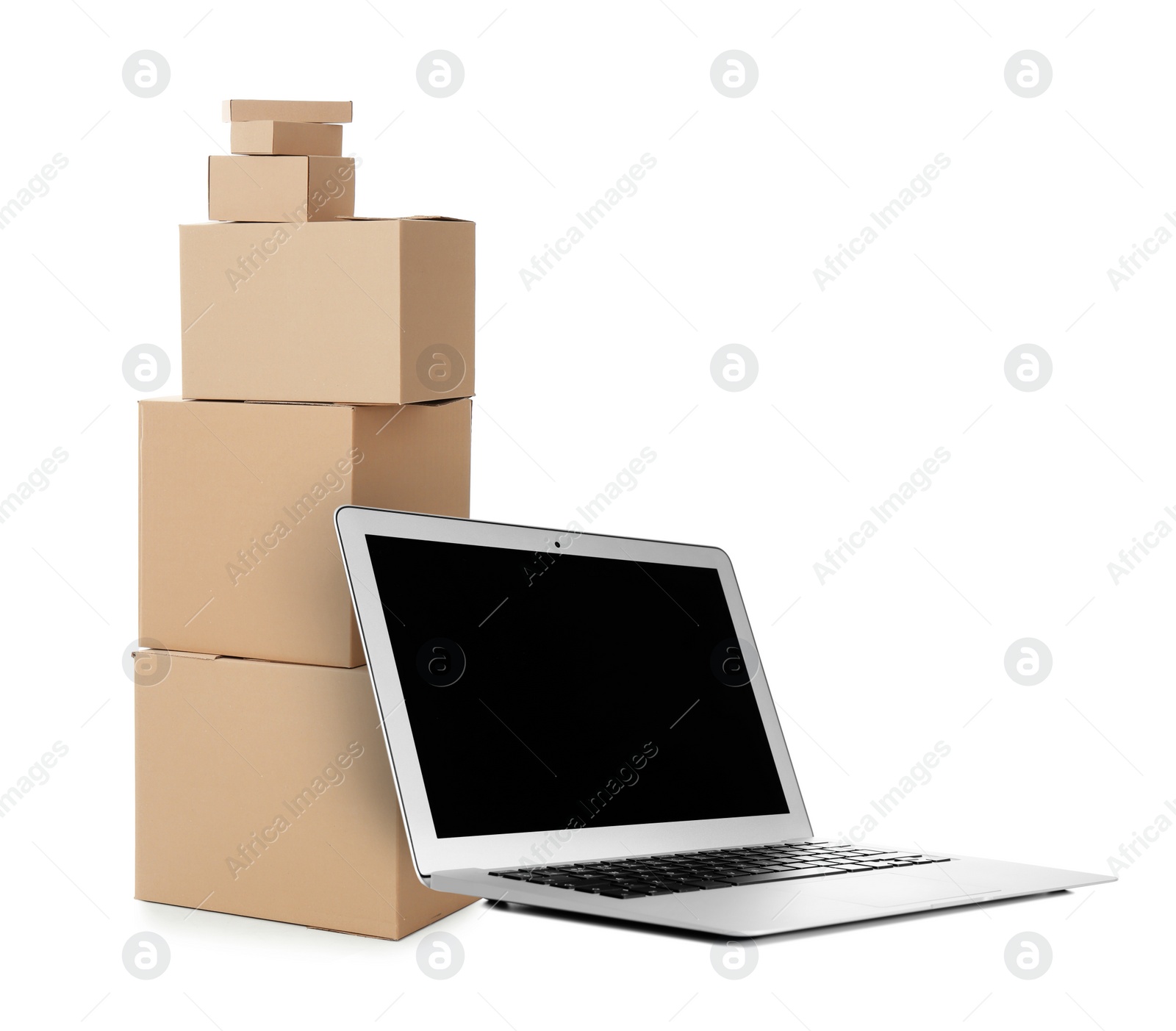 Image of Online selling. Laptop and parcels on white background