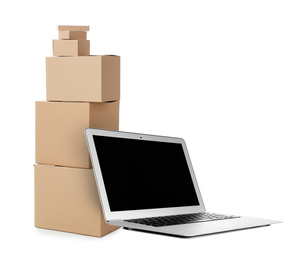 Image of Online selling. Laptop and parcels on white background