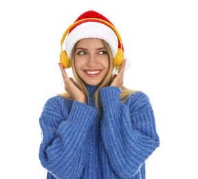 Happy woman with headphones on white background. Christmas music