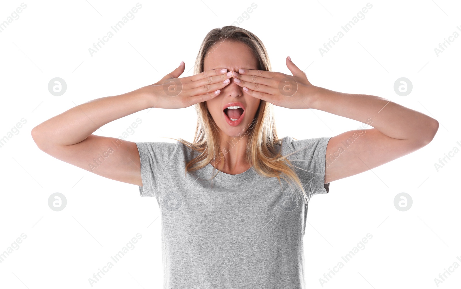 Photo of Young woman covering eyes with hands on white background