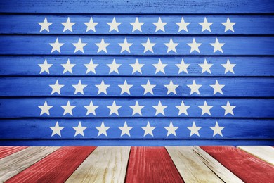 Image of 4th of July - USA Independence Day. Red and white striped wooden surface on blue background with stars, space for design