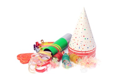 Photo of Party crackers and different festive items on white background
