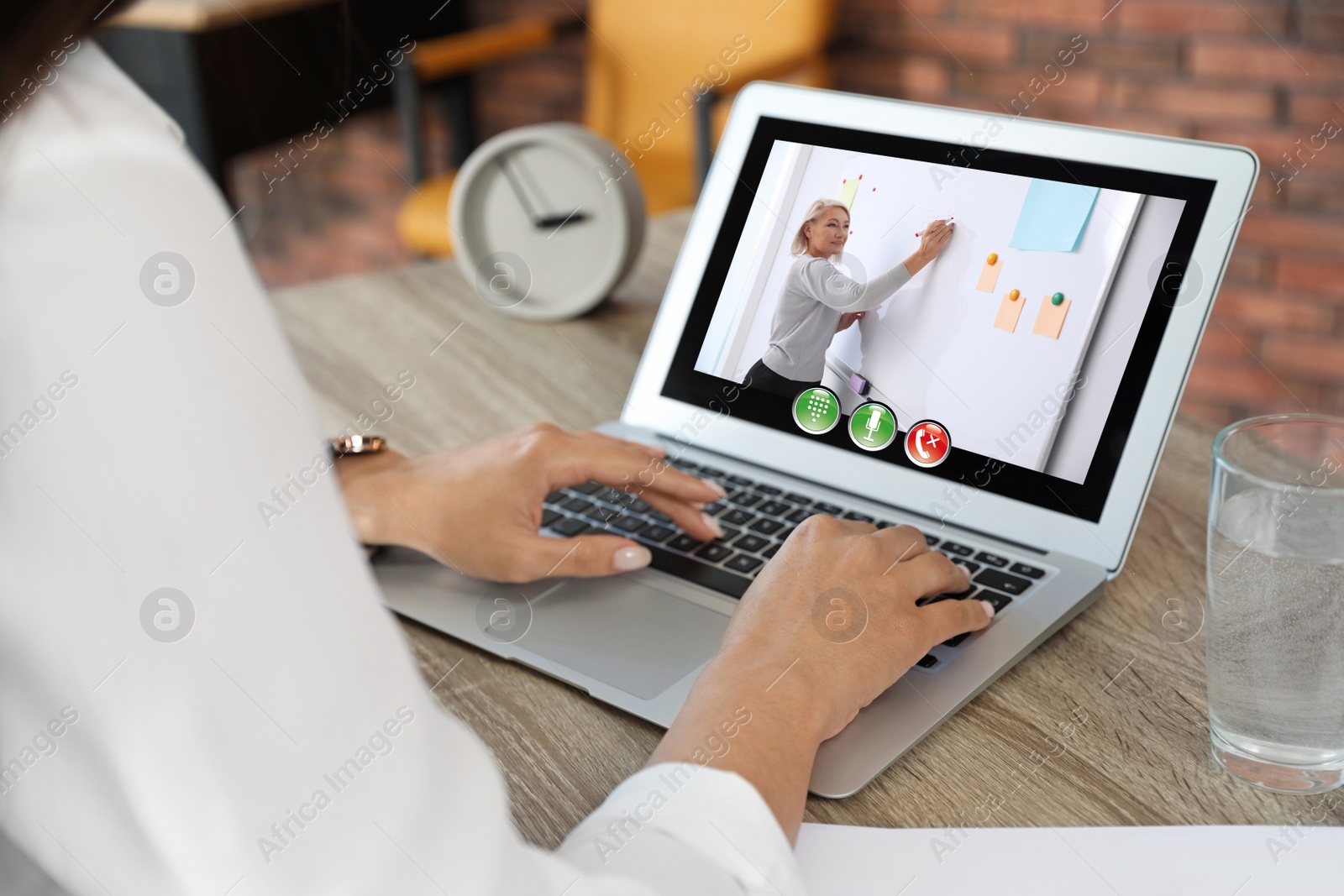 Image of Distance learning, online school lesson. Girl studying at home during quarantine and lockdown due to Covid-19 pandemic, closeup