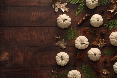 Photo of Flat lay composition with ripe white pumpkins on wooden table. Space for text