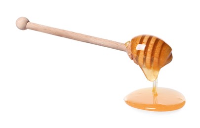 Photo of Natural honey dripping from dipper on white background