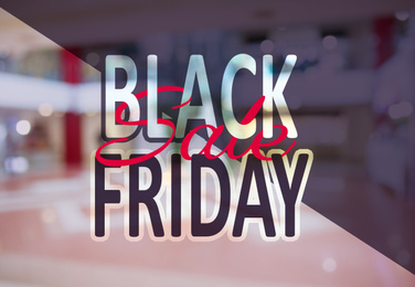 Image of Blurred view of shopping mall entrance hall interior. Black Friday Sale