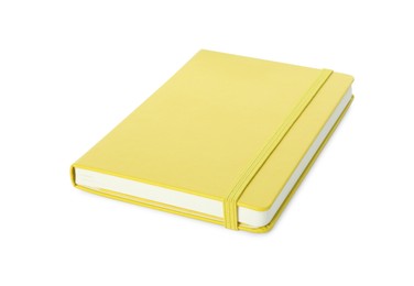 Closed notebook with blank yellow cover isolated on white