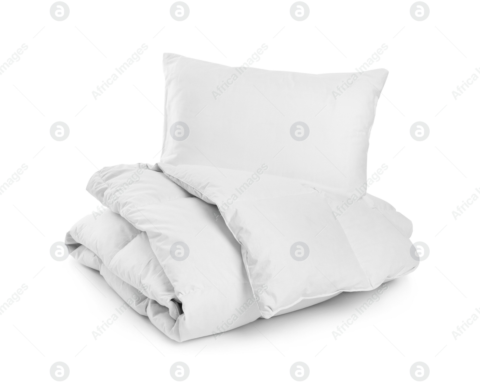 Photo of Clean blanket and pillow on white background