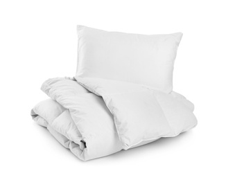 Photo of Clean blanket and pillow on white background