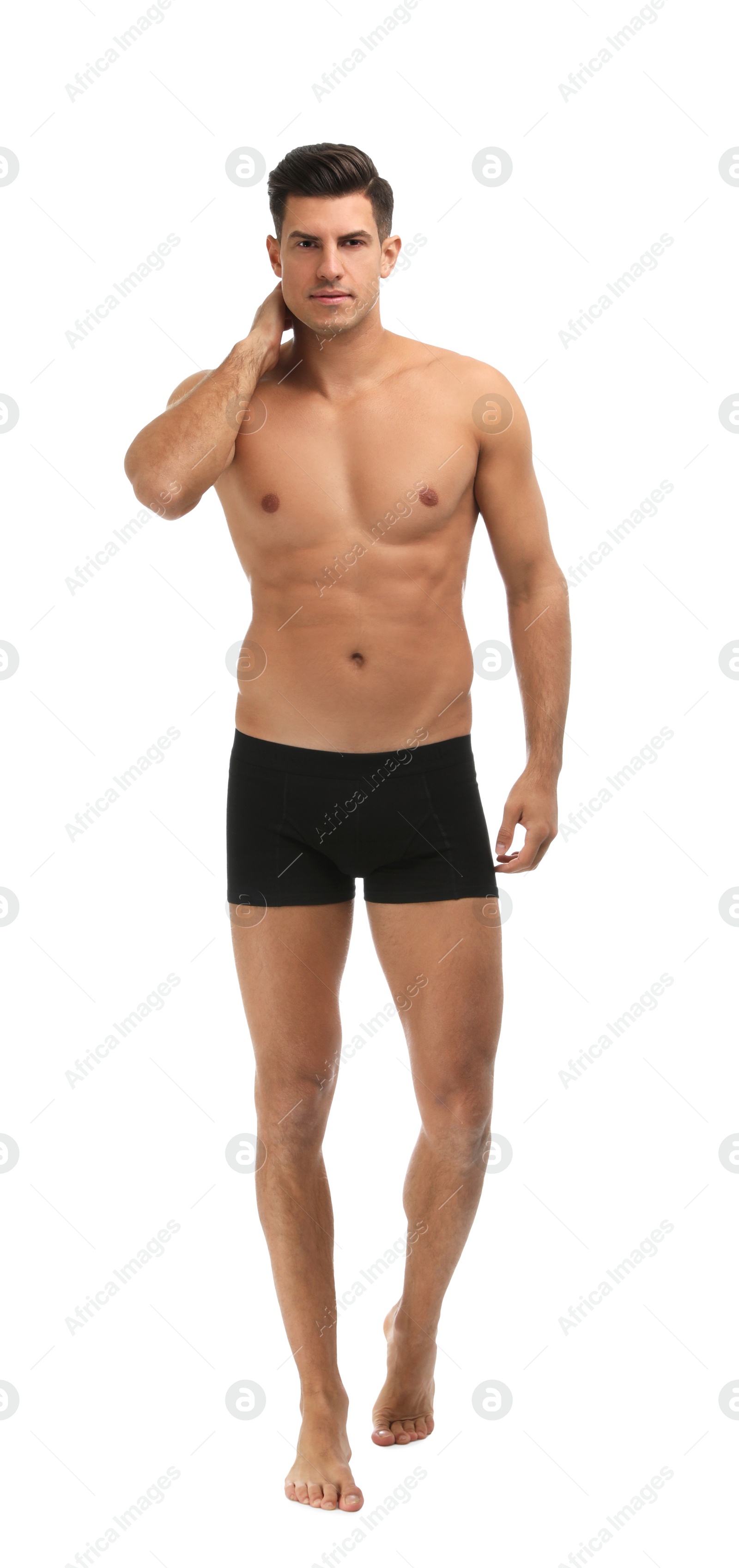 Photo of Handsome man in black underwear on white background