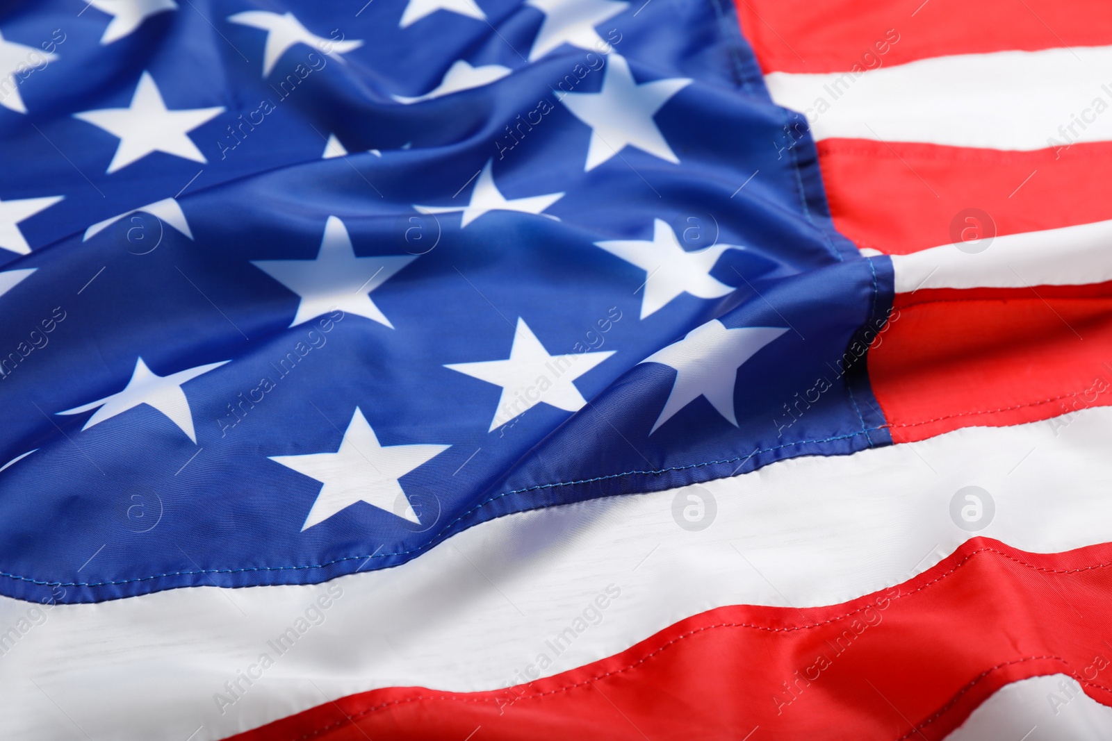 Photo of American flag as background, closeup. National symbol of USA