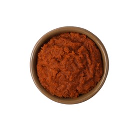 Photo of Tasty curry paste in bowl isolated on white, top view