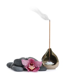 Photo of Incense stick smoldering in holder near orchid flower and spa stones on white background