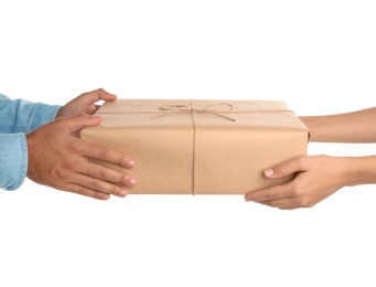 Photo of Woman receiving parcel from courier on white background, closeup