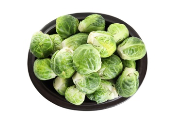 Fresh Brussels sprouts in bowl isolated on white, top view