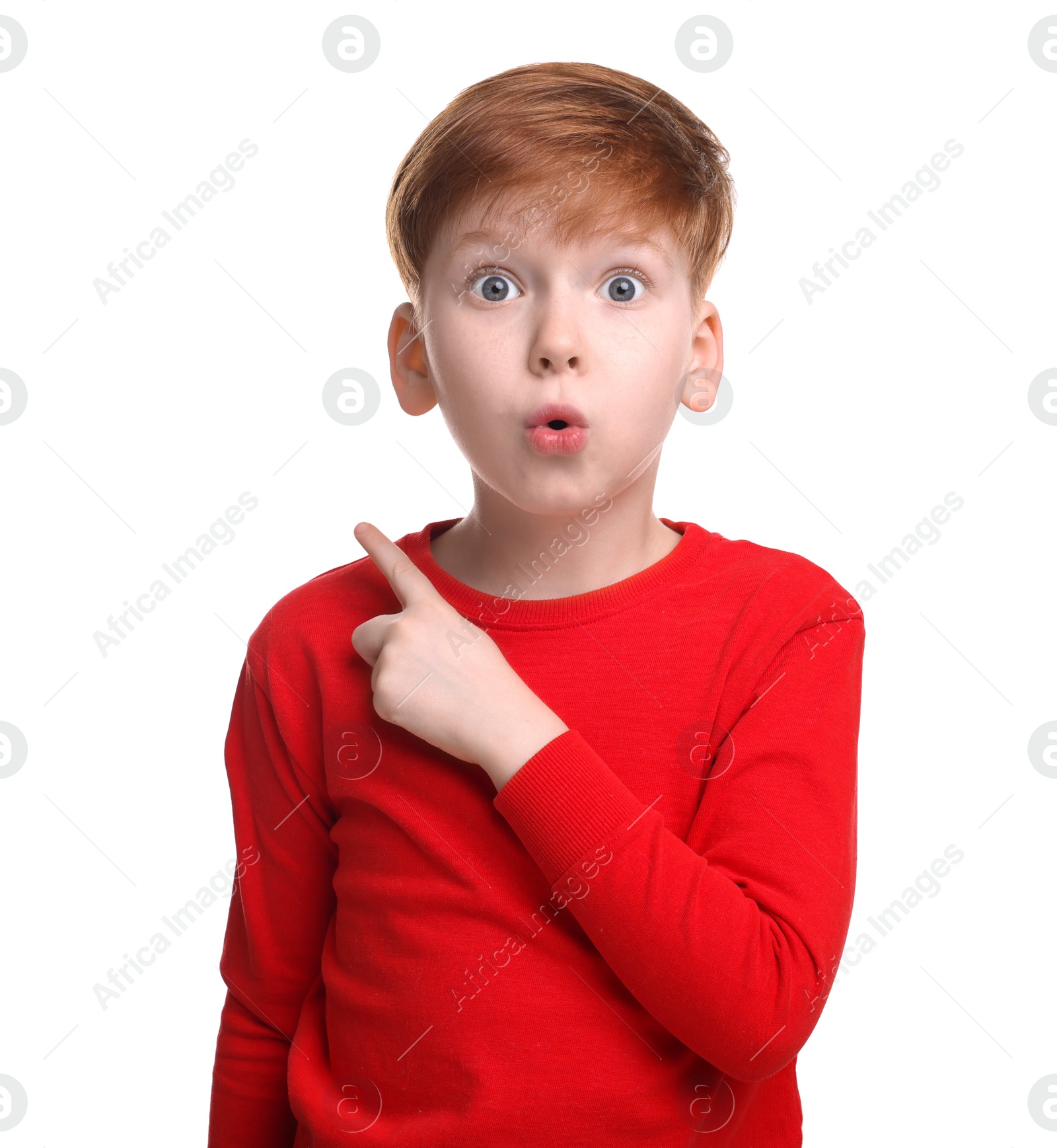 Photo of Portrait of surprised little boy on white background