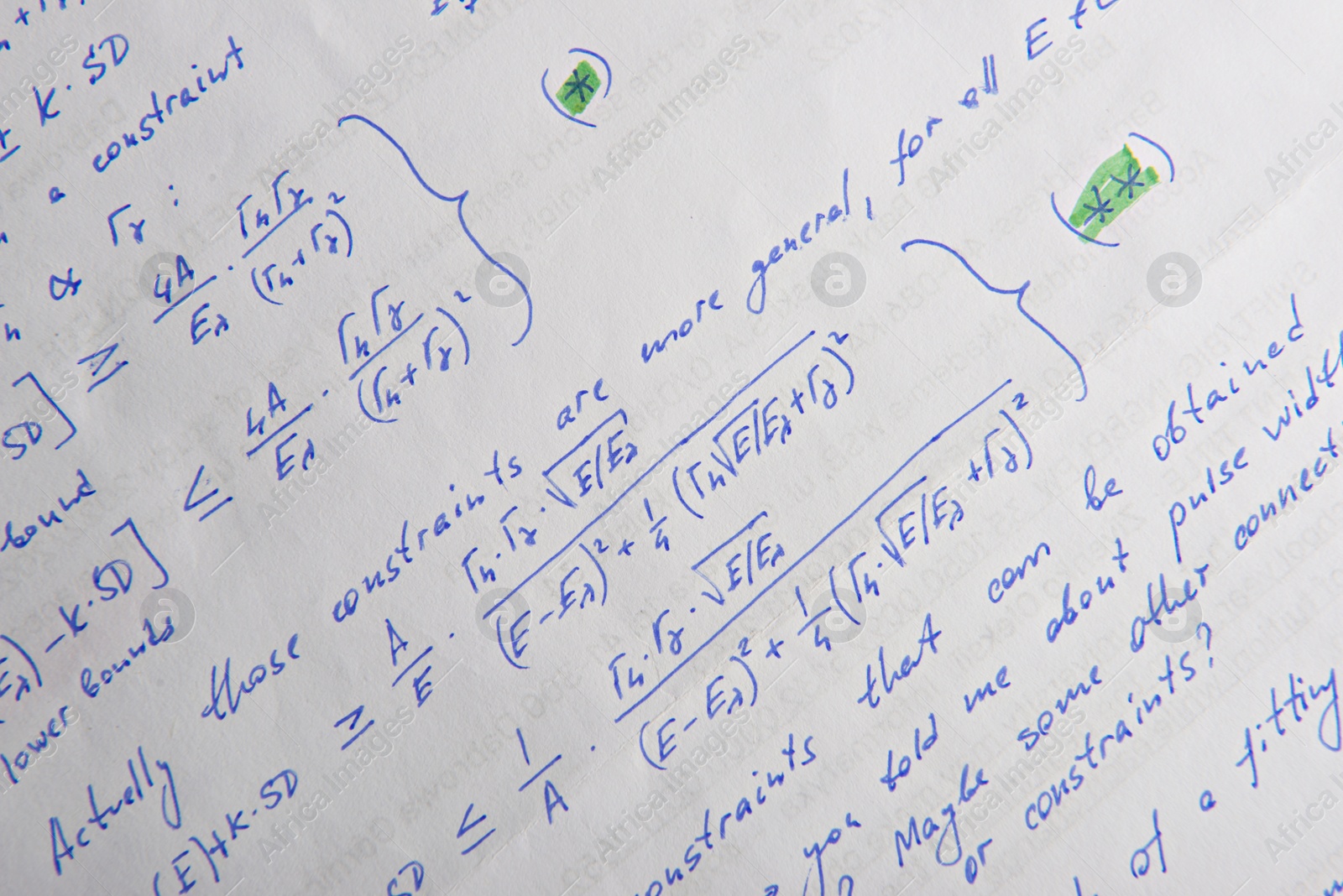 Photo of Paper with written mathematical calculations as background, closeup