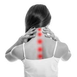 Woman suffering from rheumatism on white background. Black and white effect with red accent in painful area