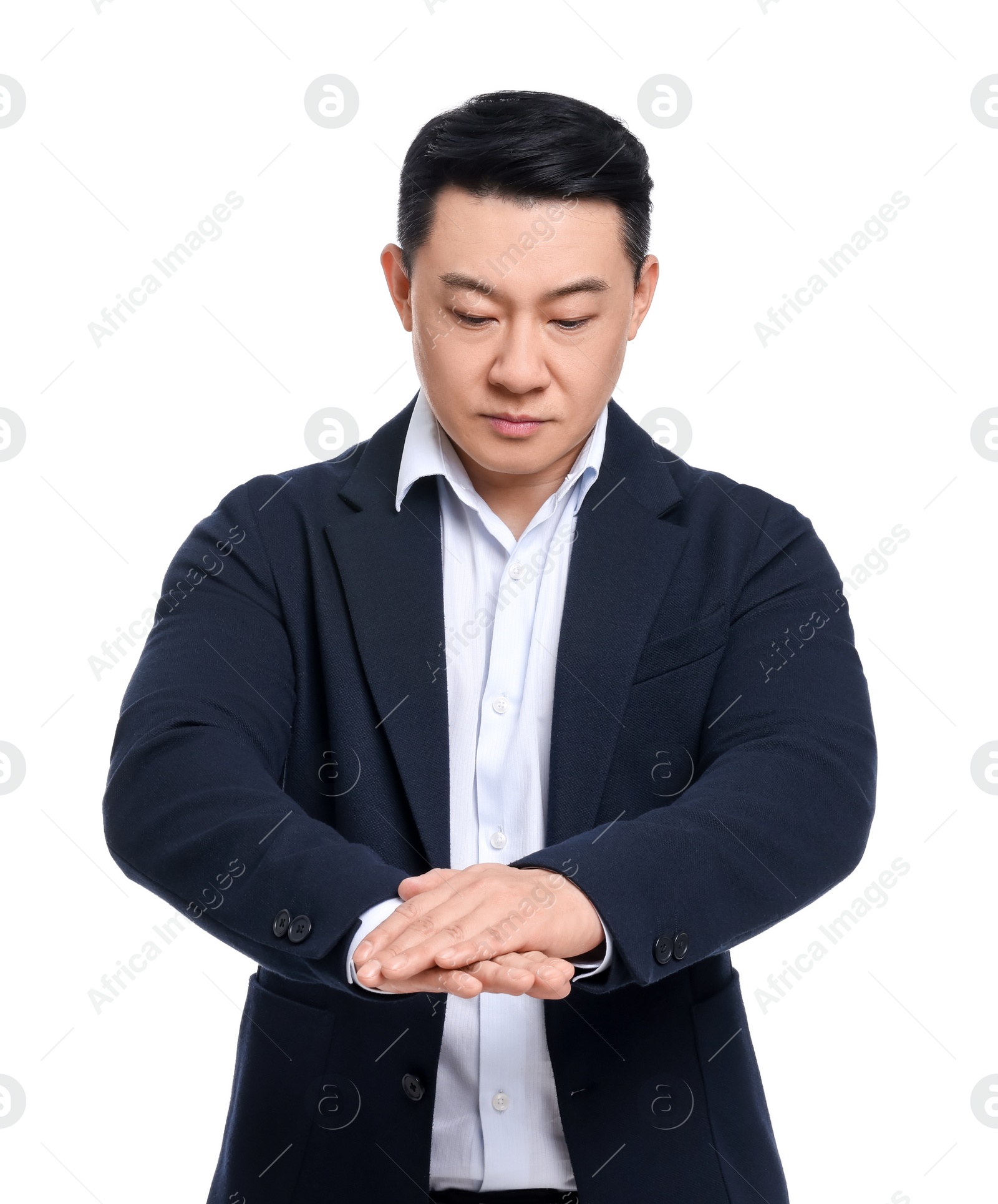 Photo of Businessman in suit posing on white background