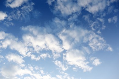 Photo of Picturesque view of beautiful fluffy clouds in light blue sky