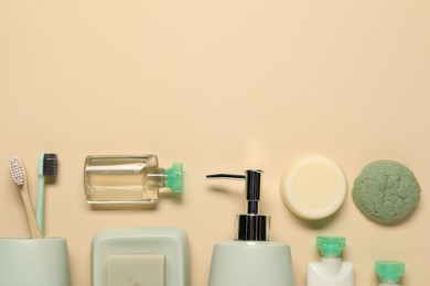 Bath accessories. Flat lay composition with personal care products on beige background, space for text