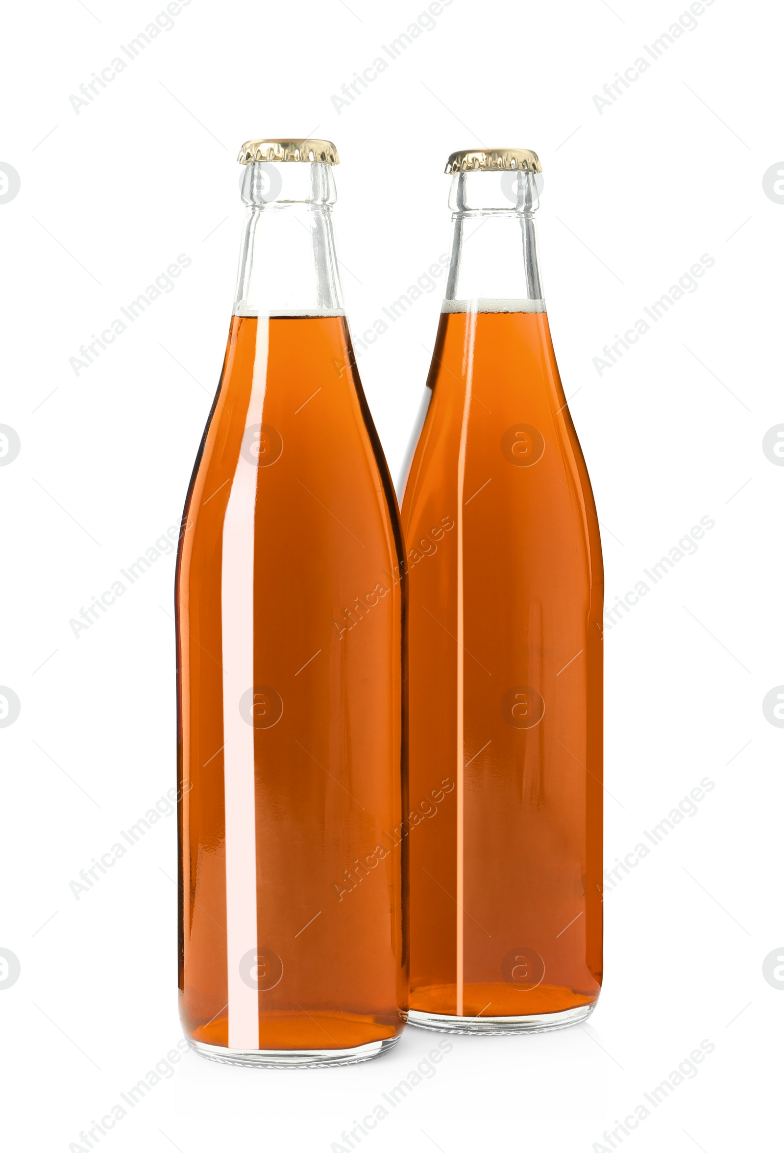Photo of Bottles of delicious fresh kvass isolated on white