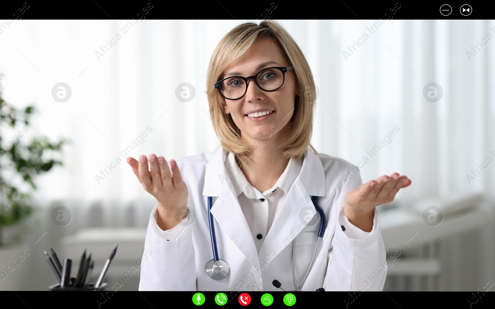 Image of Online medical consultation. Doctor working via video chat application