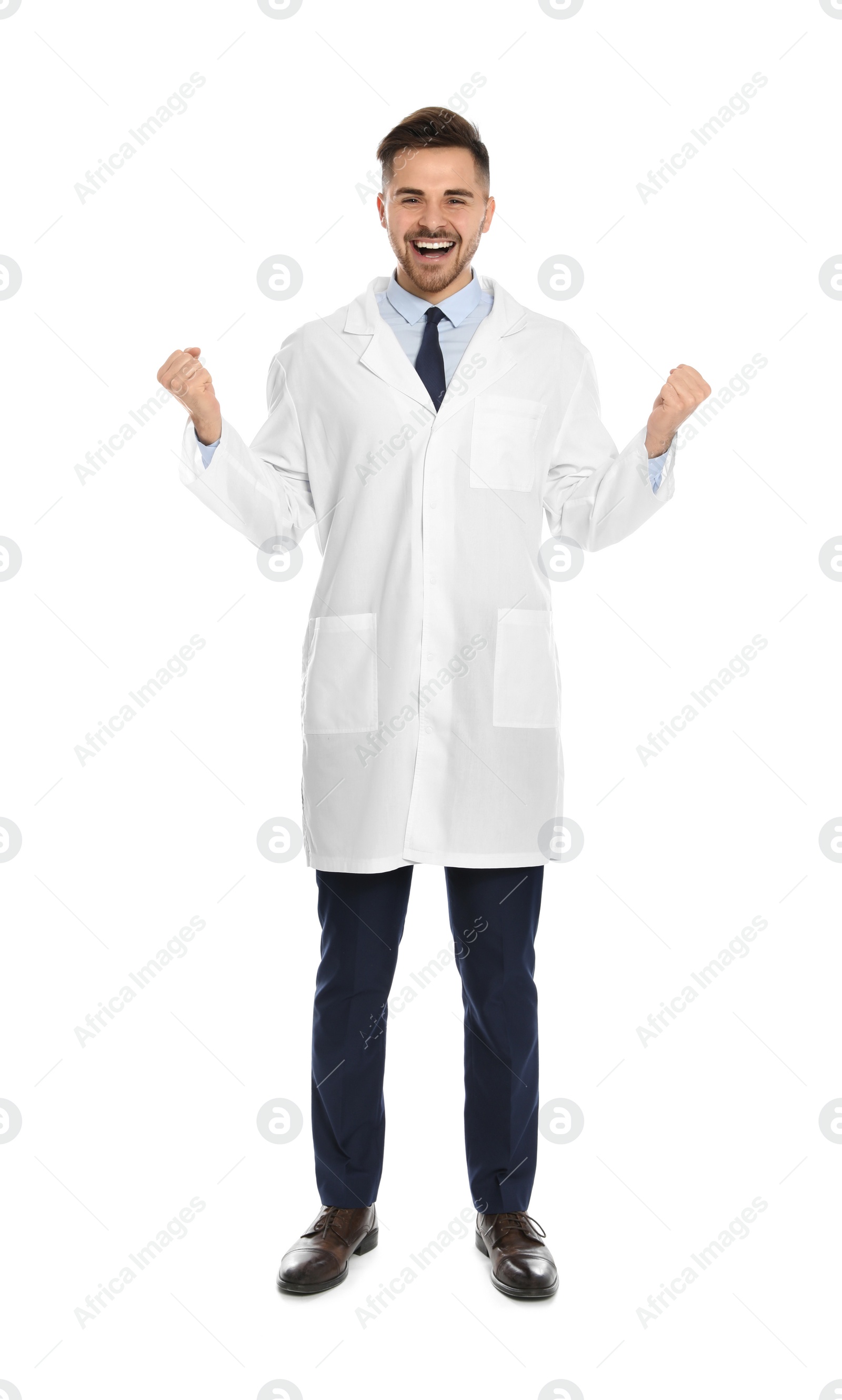 Photo of Full length portrait of emotional medical doctor isolated on white