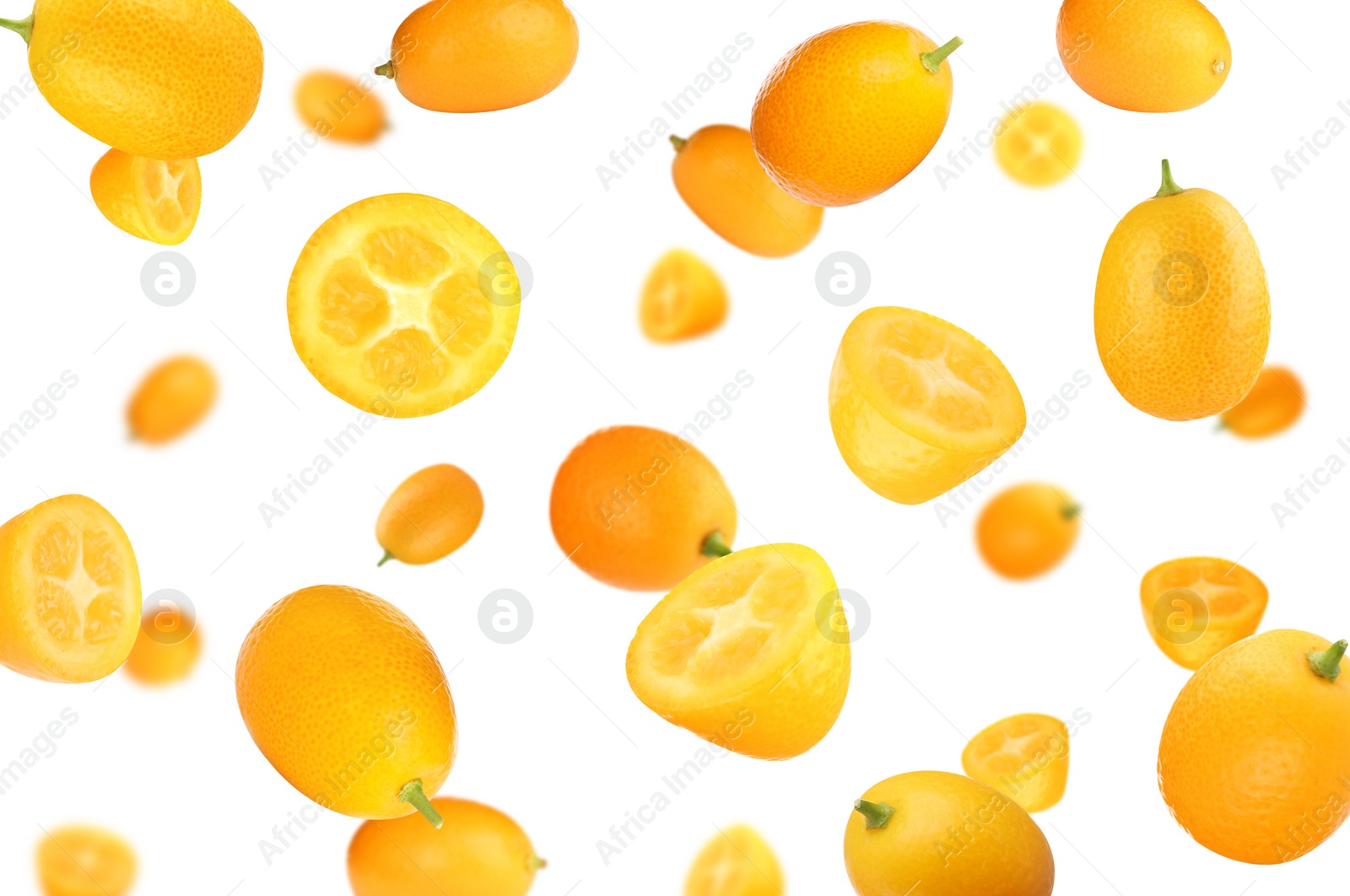 Image of Fresh ripe kumquat fruits falling on white background 