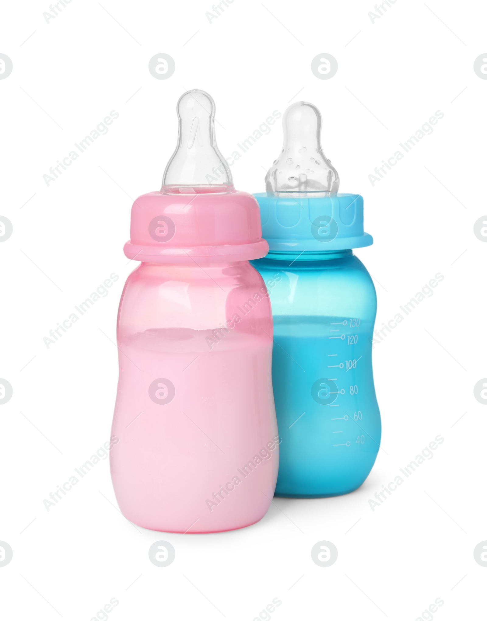 Photo of Feeding bottles with milk on white background