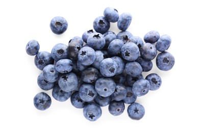 Photo of Pile of tasty fresh ripe blueberries on white background, top view