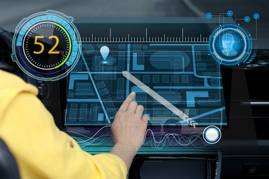 Image of Woman using navigation system while driving car, closeup