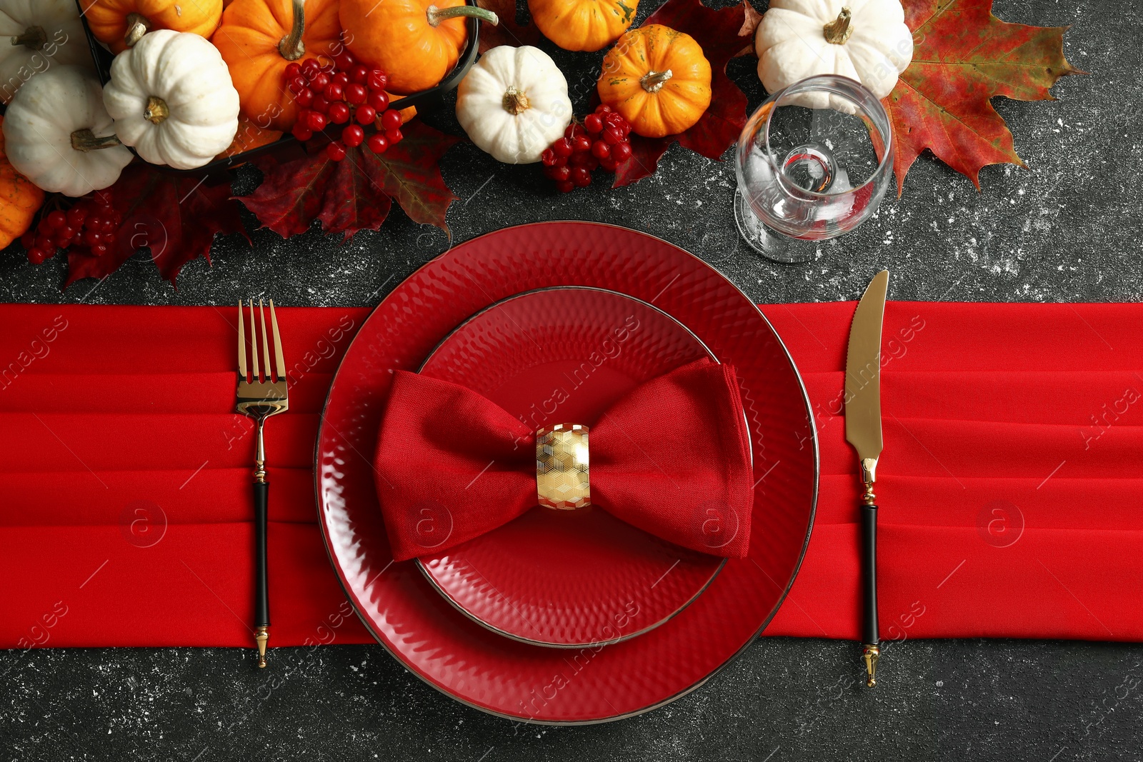 Photo of Happy Thanksgiving day. Beautiful table setting and autumn decoration on black background, flat lay