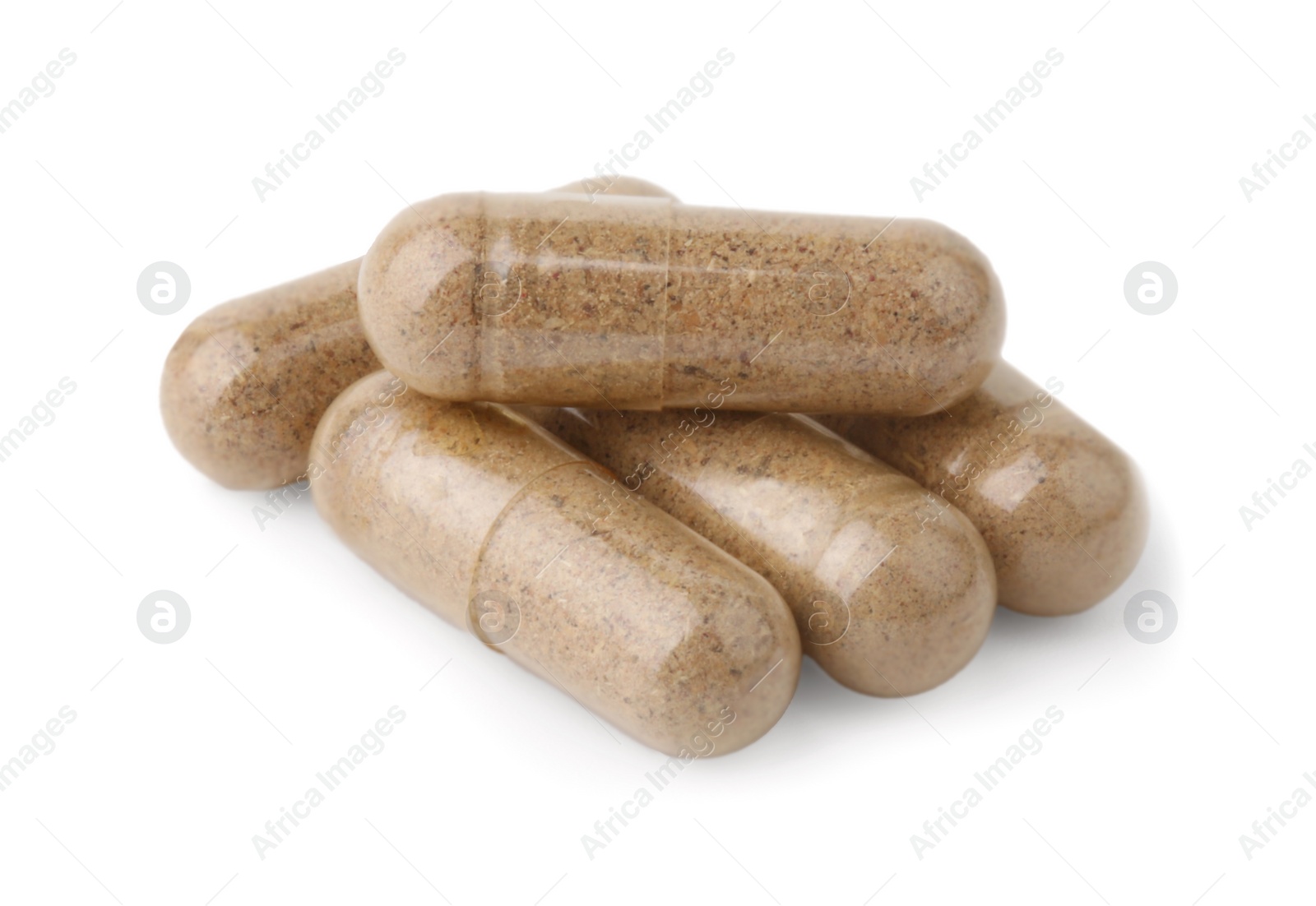 Photo of Pile of vitamin capsules isolated on white