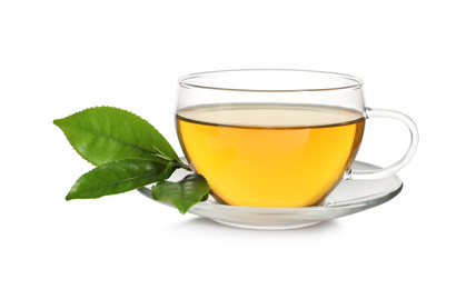 Tasty green tea and fresh leaves on white background