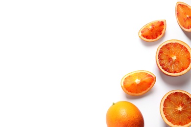 Fresh bloody oranges on white background, top view. Citrus fruits