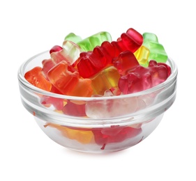 Glass bowl with delicious jelly bears on white background