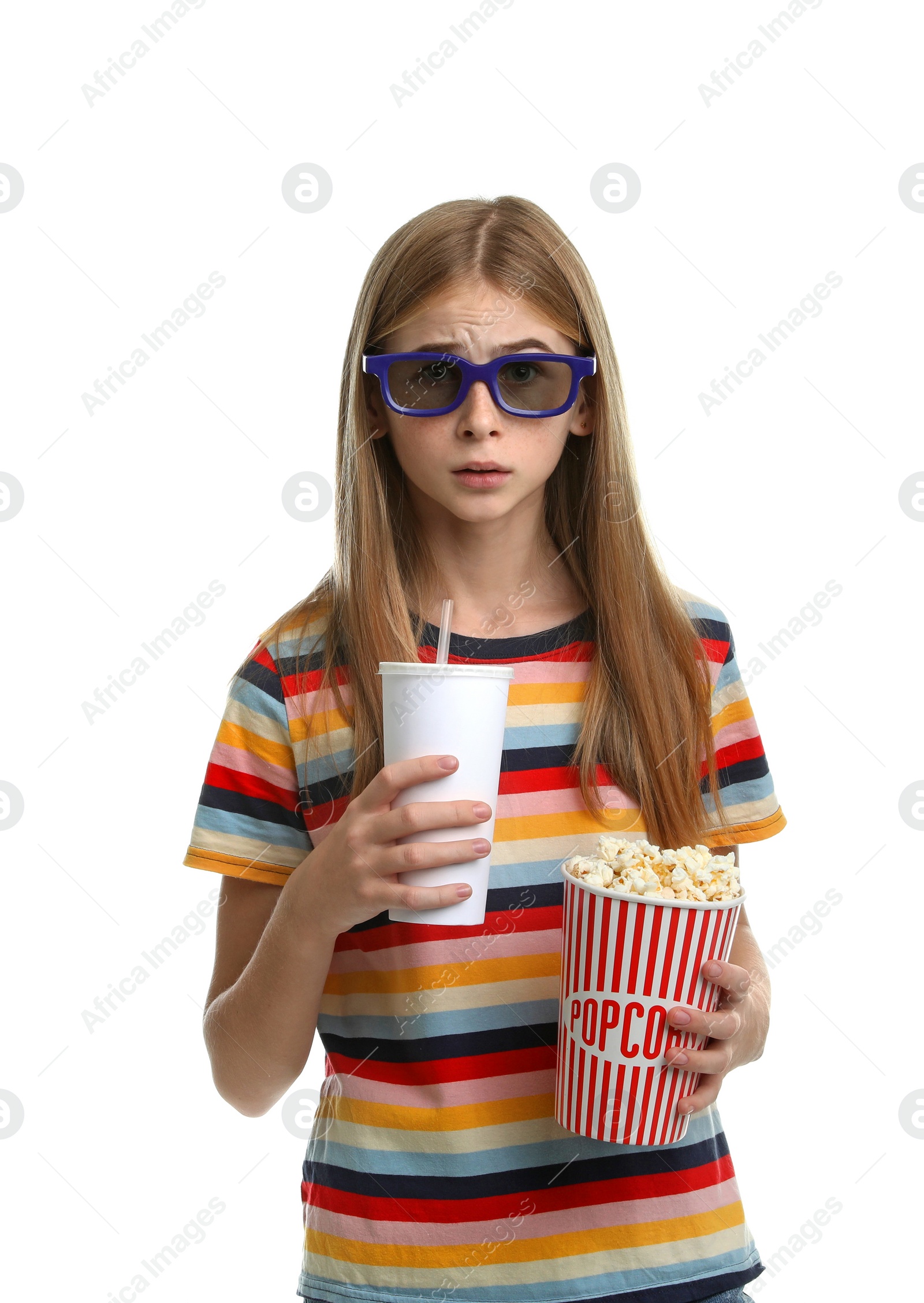 Photo of Emotional teenage girl with 3D glasses, popcorn and beverage during cinema show on white background