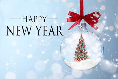 Happy New Year. Beautiful glass ball with Christmas tree and gifts on light blue background