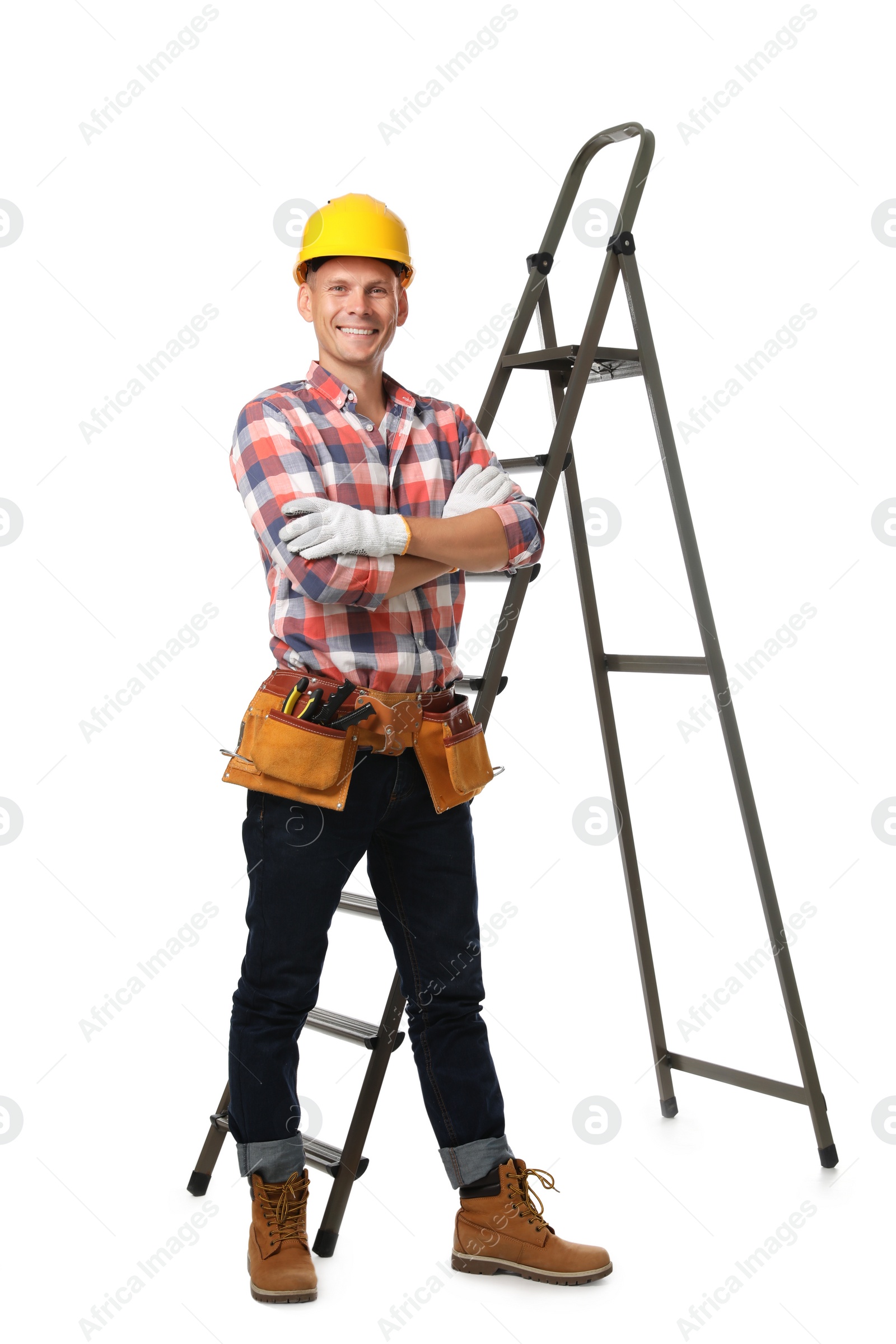 Photo of Professional constructor near ladder on white background