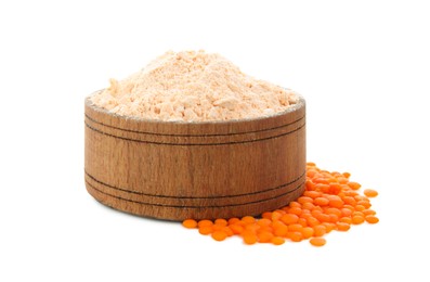 Photo of Lentil flour in wooden bowl and seeds isolated on white