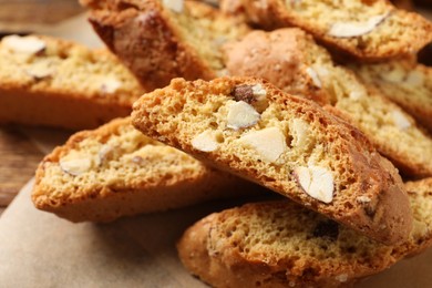 Photo of Traditional Italian almond biscuits (Cantucci) on table, closeup